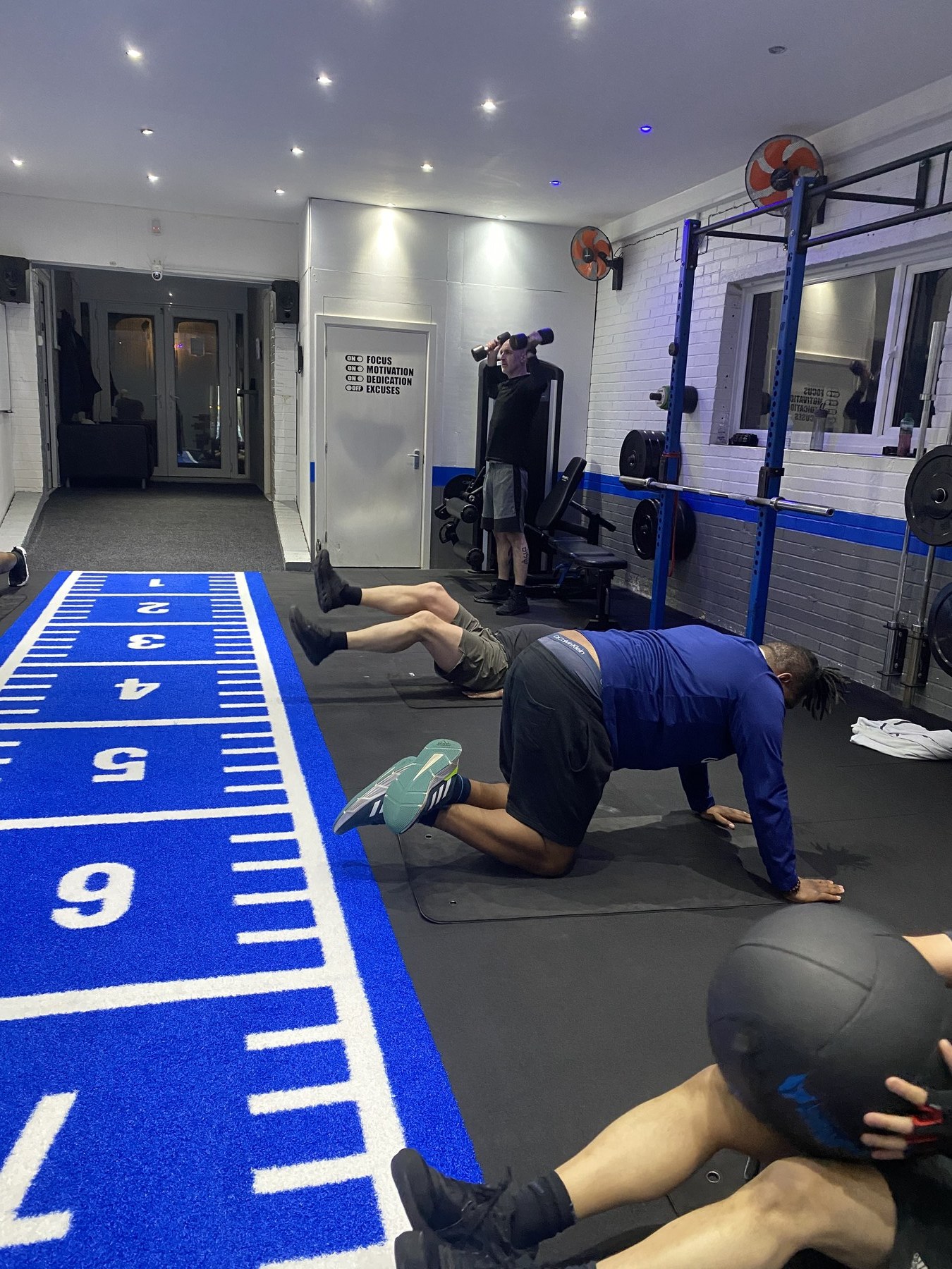 Group of men training together at SPS Fitness Halesowen during a small group session