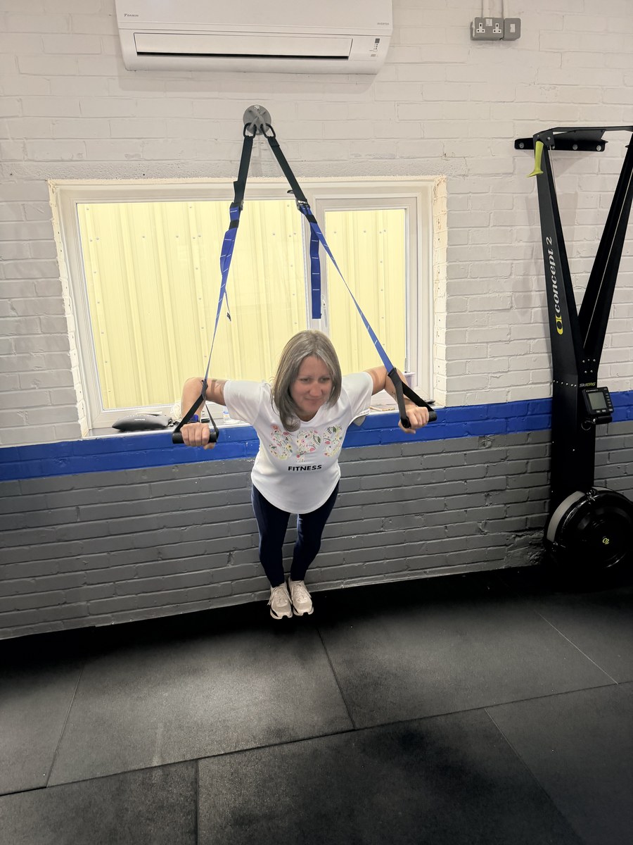 SPS Fitness member training on the TRX suspension trainer in the Halesowen studio